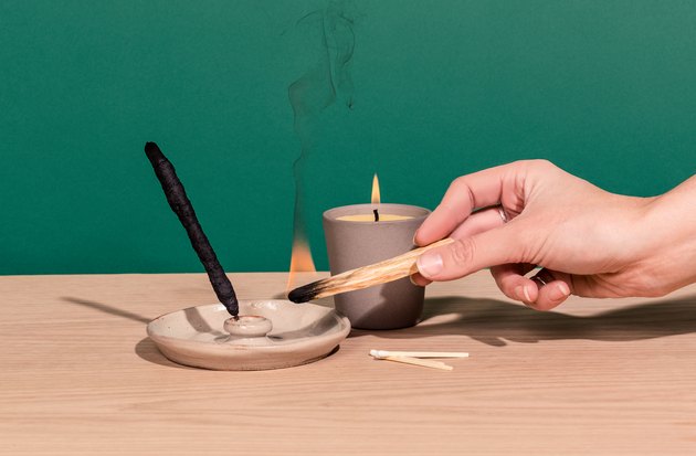 burning candle and incense