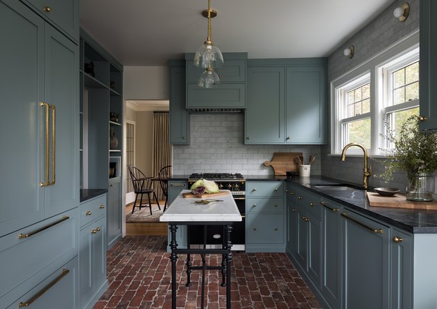 kitchen cabinet color idea with blue cabinets and brick floor