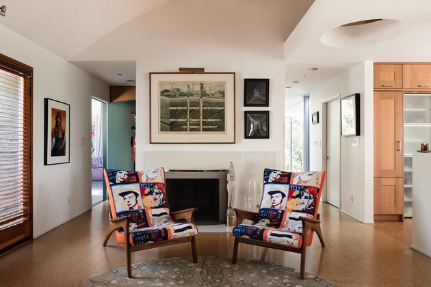 living room with cork floors and accent chairs
