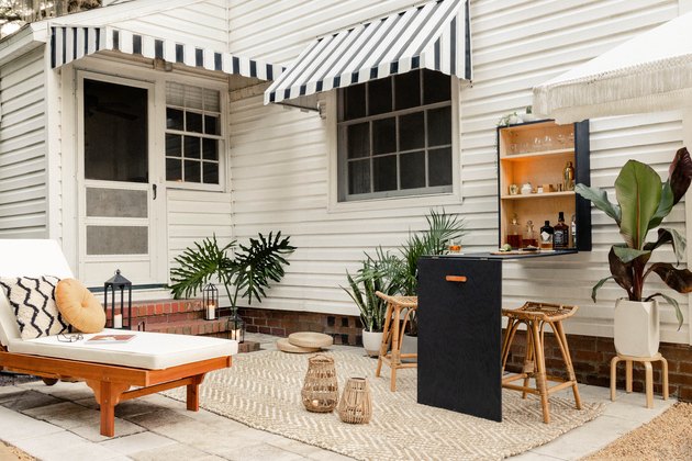 Patio with folded down Murphy bar mounted to wall