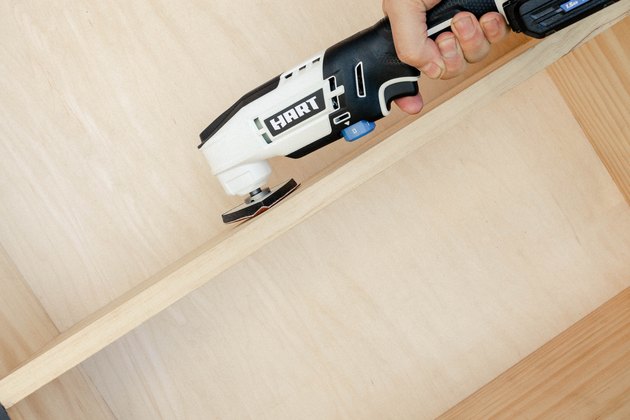 Sanding wood cabinet with HART oscillating multi-tool