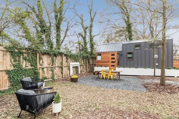Tiny cabin with outdoor yard space.