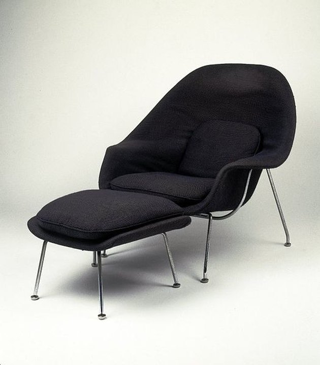black chair with foot stool