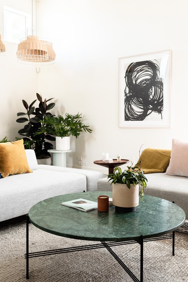 Article Divan sofa in Hunker House living room with throw pillows