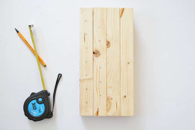 Tape measure and wooden bee house