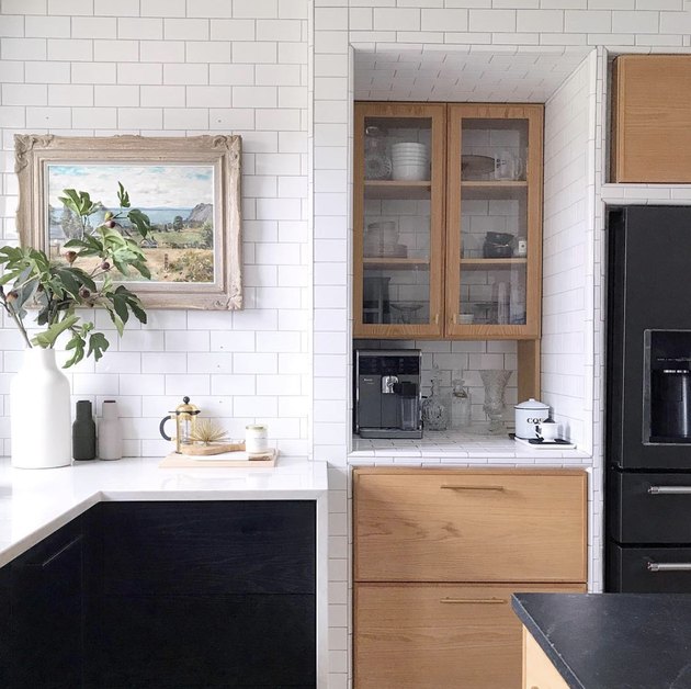 black kitchen cabinet idea for modern kitchen with white subway tile walls