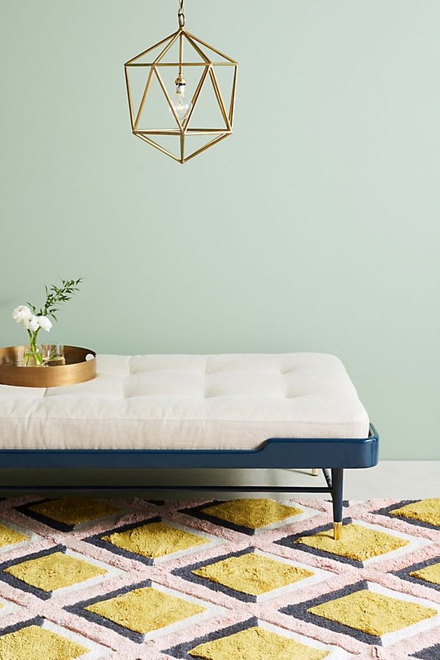 anthropologie daybed with geometric pendant