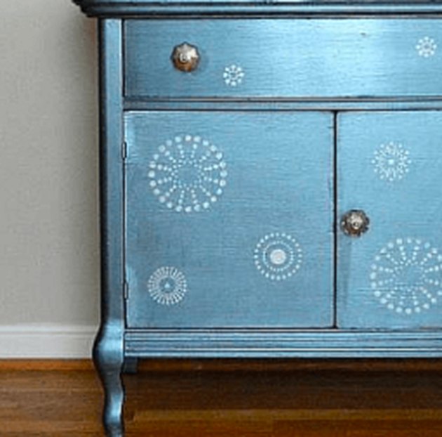 Cabinet with metallic finish.
