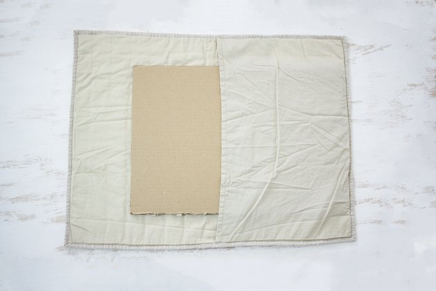 Placing cardboard inside pillow sham