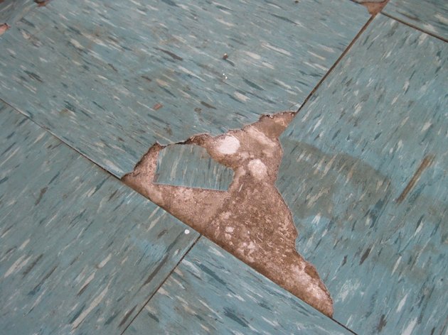 Broken floor tiles.