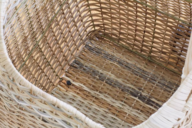Bolt secured inside basket with nut