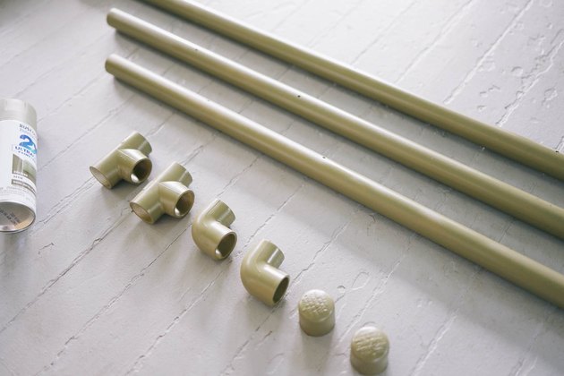 PVC pipes, c0nnectors and caps spray painted olive green