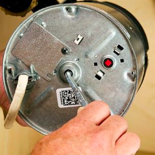 Unjamming a Garbage disposal.
