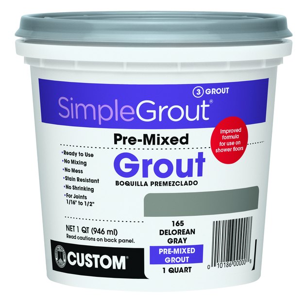 Tub of tile grout.