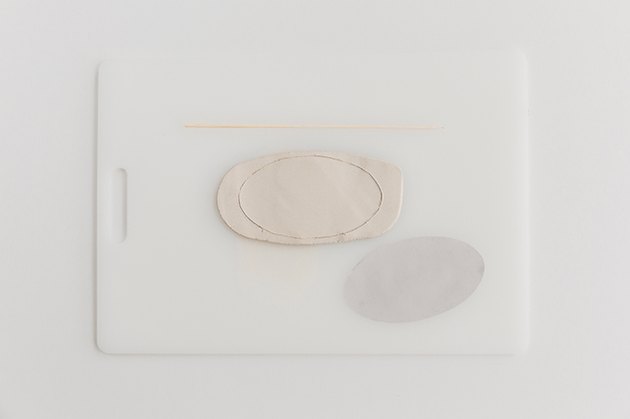 Trace the template onto the clay.