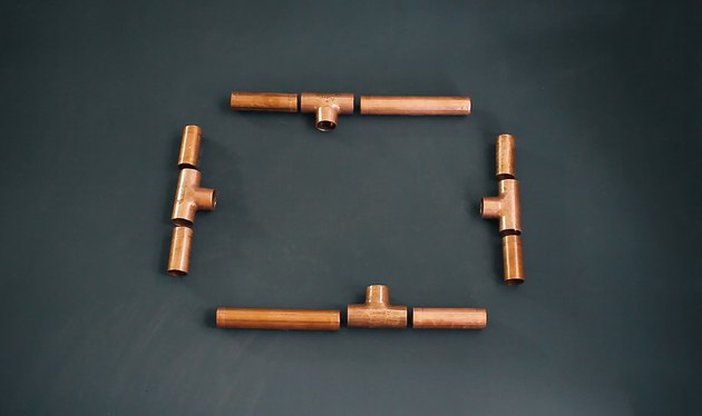 Pipes laid out for short sides of candelabra