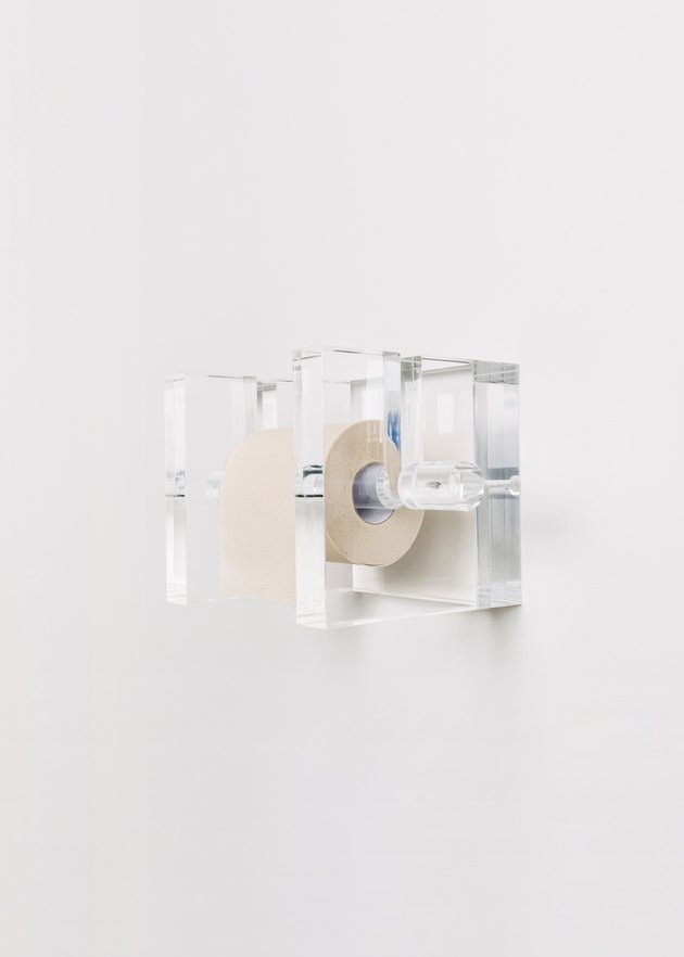 the Another Human toilet paper holder in the "Under / Over" show