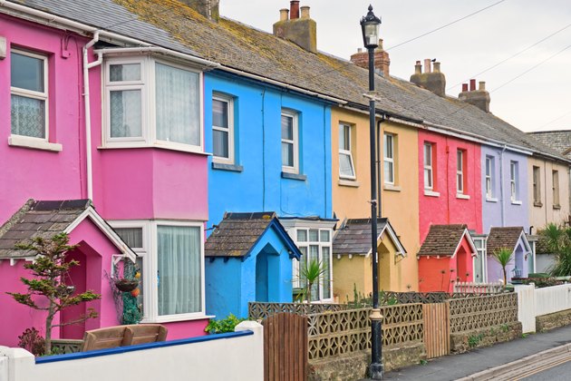A section of colorful terraced housing in a west country seaside town, UK