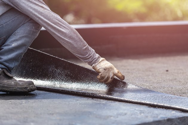 how much drop should a flat roof have to shed water? hunker