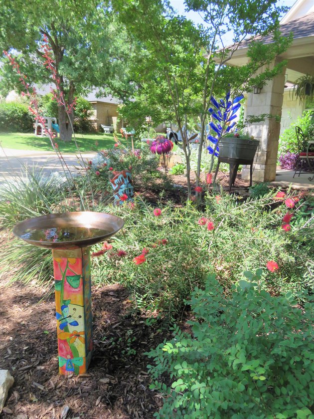 Birdbath in xeriscape garden.