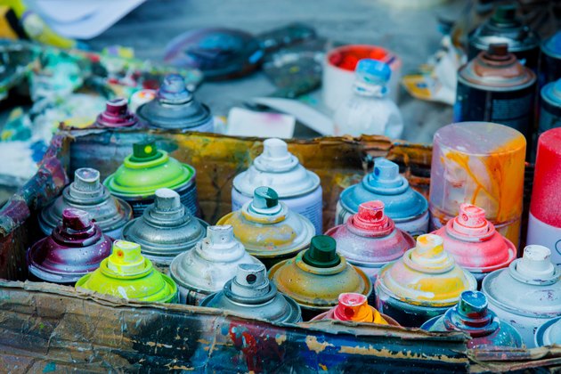 High Angle View Of Colorful Paint Cans