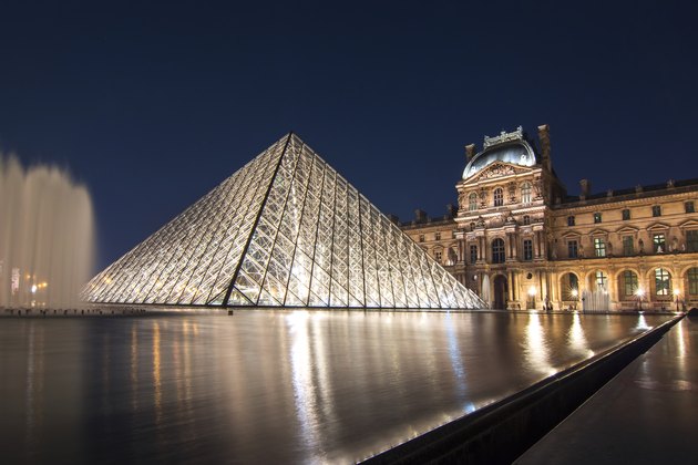 Louvre palace and pyramids at night, Paris, France