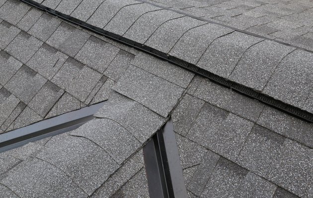 Shingled roof with peaks and valleys on the dormer