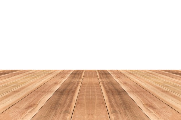 Wooden table top against white background