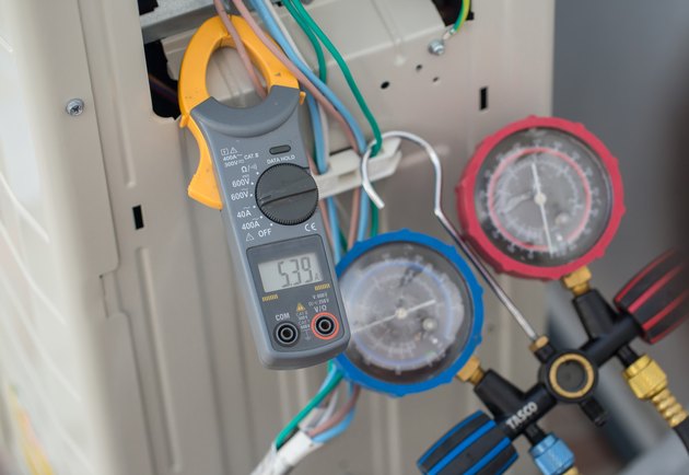 Clamp amp meter, electrician use Clamp amp meter for check or measureing the current of electrical motor system.