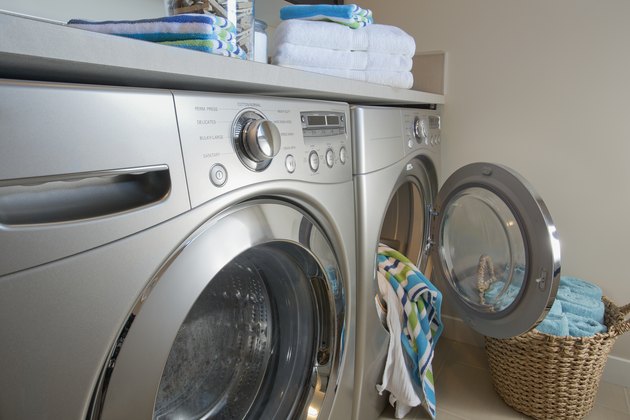 Laundry room with focus on energy efficient washer and dryer.