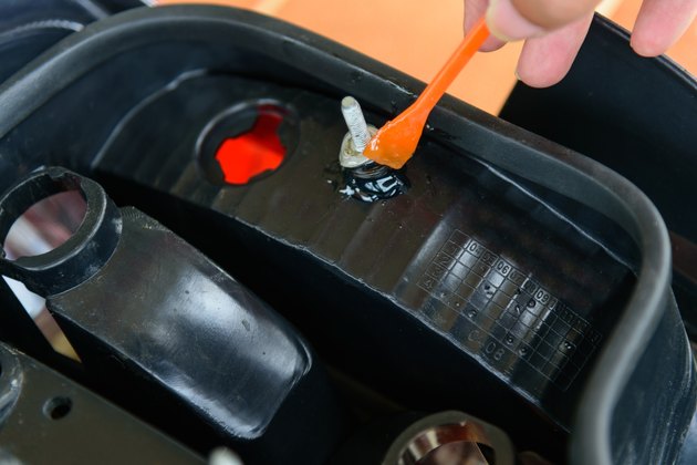 Repair broken plastic by epoxy.