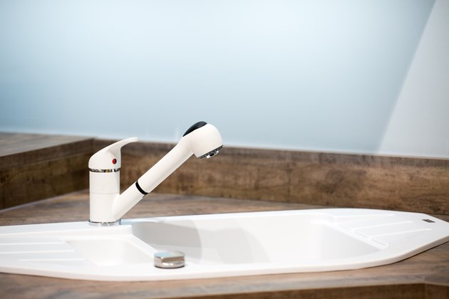 Modern kitchen interior with sink and faucet