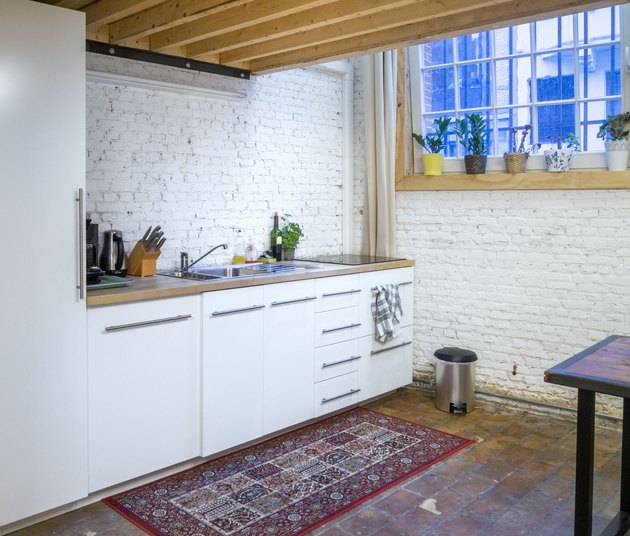 contemporary white kitchen in loft