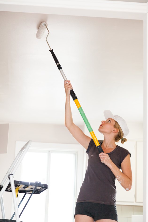Closeup of Woman Painting the Ceiling