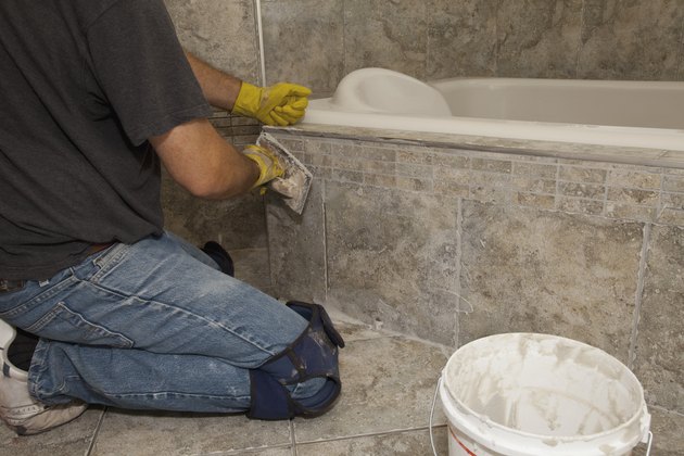 installing tiles for a home renovation
