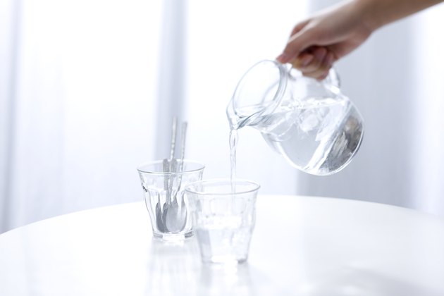 Woman pouring water