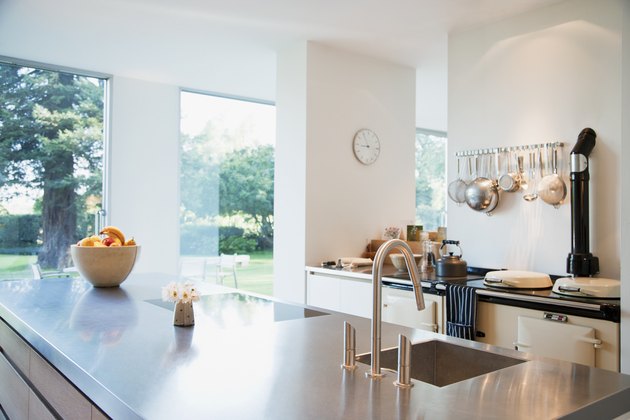 Modern kitchen with stainless steel counters.