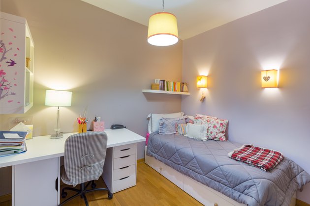 Teenager girl student bedroom.