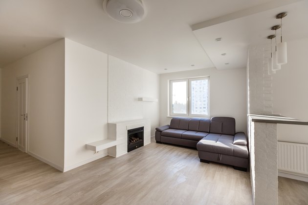 Modern, stylish living room with big gray sofa