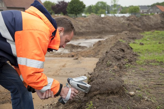 Analysing the soil with HXRF and taking samples, environmetal research.