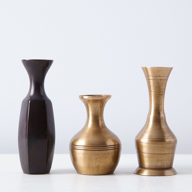 These brass bud vases live and breathe the adage "a little goes a long way". Drop just a few stems in one of these vintage-inspired charmers and boom, instant arrangement. They come in three different styles, all mixable and matchable.

