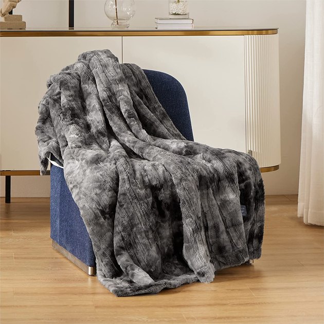 Chances are, this might be your new go-to blanket. With faux fur, four heat settings, and four timer options, this low-voltage blanket will feel like a total luxury buy.