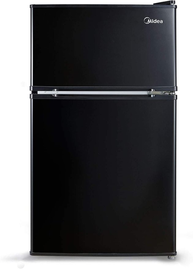 If frozen food is part of your weekly grocery shopping haul, you’re going to need a mini fridge with a separate freezer, like this pick from Midea.