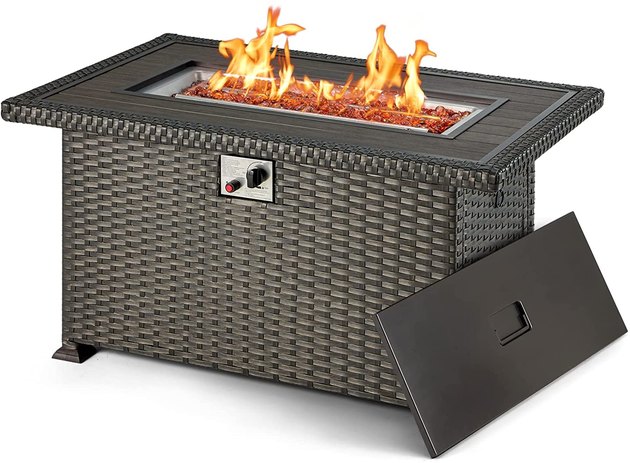 This stylish fire pit table is the perfect addition to your next outdoor family gathering. It burns propane gas with fire glass beads, which means there is no messy clean-up. It also doubles as a coffee or dining table if you need extra space. 