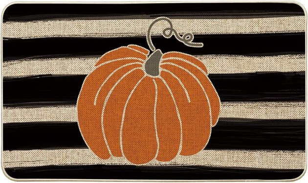 If you're not afraid of a bold graphic, this striped pumpkin doormat is for you.