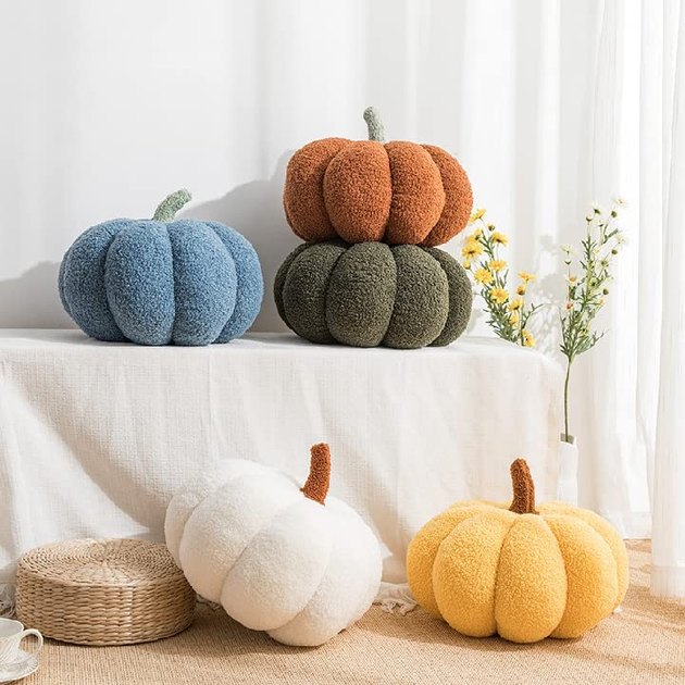 We may need this pumpkin-shaped pillow in every size and color available. Whether strewn on your sofa or cozying up the corners of your child's playroom, these sherpa pillows are the perfect seasonal touch.