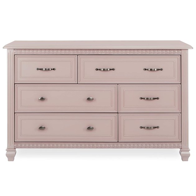 Featuring an Art Deco inlay trim and a dreamy blush hue, this dresser will add a touch of elegance to any look.