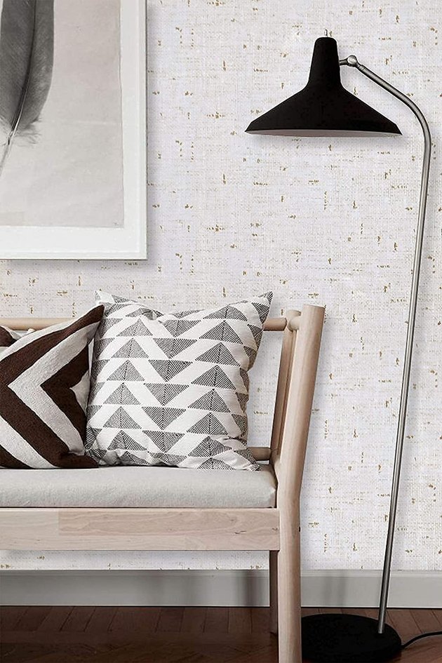 Grasscloth wallpaper can instantly elevate any room, and this one features a unique two-tone color palette.