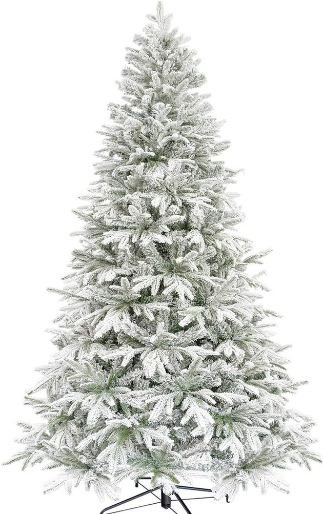 Let it snow, let it snow, let it snow — and bring that (artificial) snow indoors with this realistic fir tree with snow-laden branches.