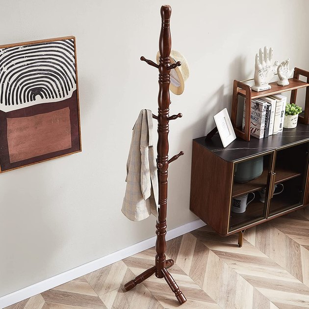 Keep it classic with this freestanding coat rack crafted from thick, solid wood. It's finished with environmentally friendly lacquer, which is waterproof, anti-corrosion, and non-toxic. The nine well-spaced hooks with accommodate the whole crew.